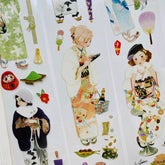 Japanese festival PET tape display with women in colorful kimonos, Daruma doll, food items