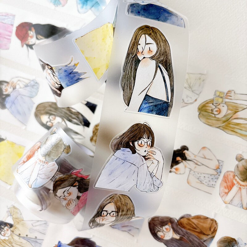 Close-up of die-cut watercolor girl portraits tape