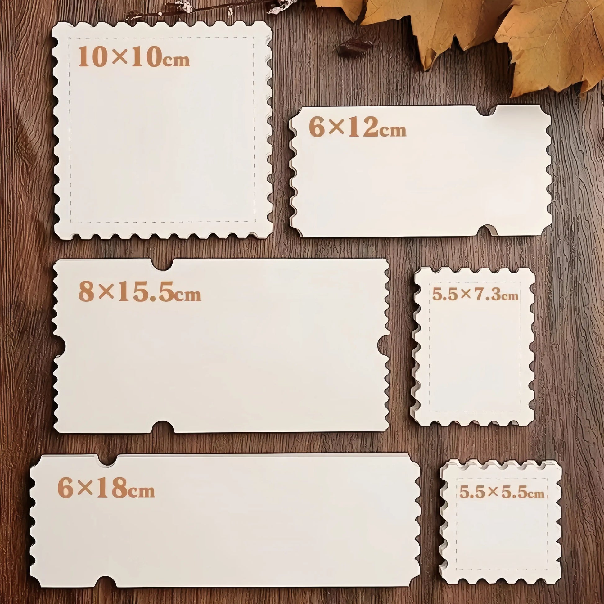 Six blank stamp and ticket card sizes arranged flat: 10x10cm, 6x12cm, 8x15.5cm, 5.5x7.3cm, 6x18cm, and 5.5x5.5cm, each with stamp-style scalloped edges