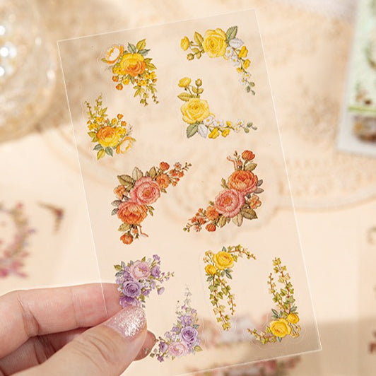Floral embroidery frame sticker book with botanical borders, wreaths, rabbits, butterflies, ribbons, and photo frame designs