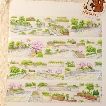 Watercolor PET tape artwork with park flower beds, planters, paved paths, stairs, and soft pink blossoms
