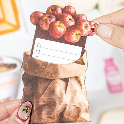 Fragments scrapbook kit with no-cut food pieces, daily notes, photo layouts, memory book cards, and handmade paper scenes