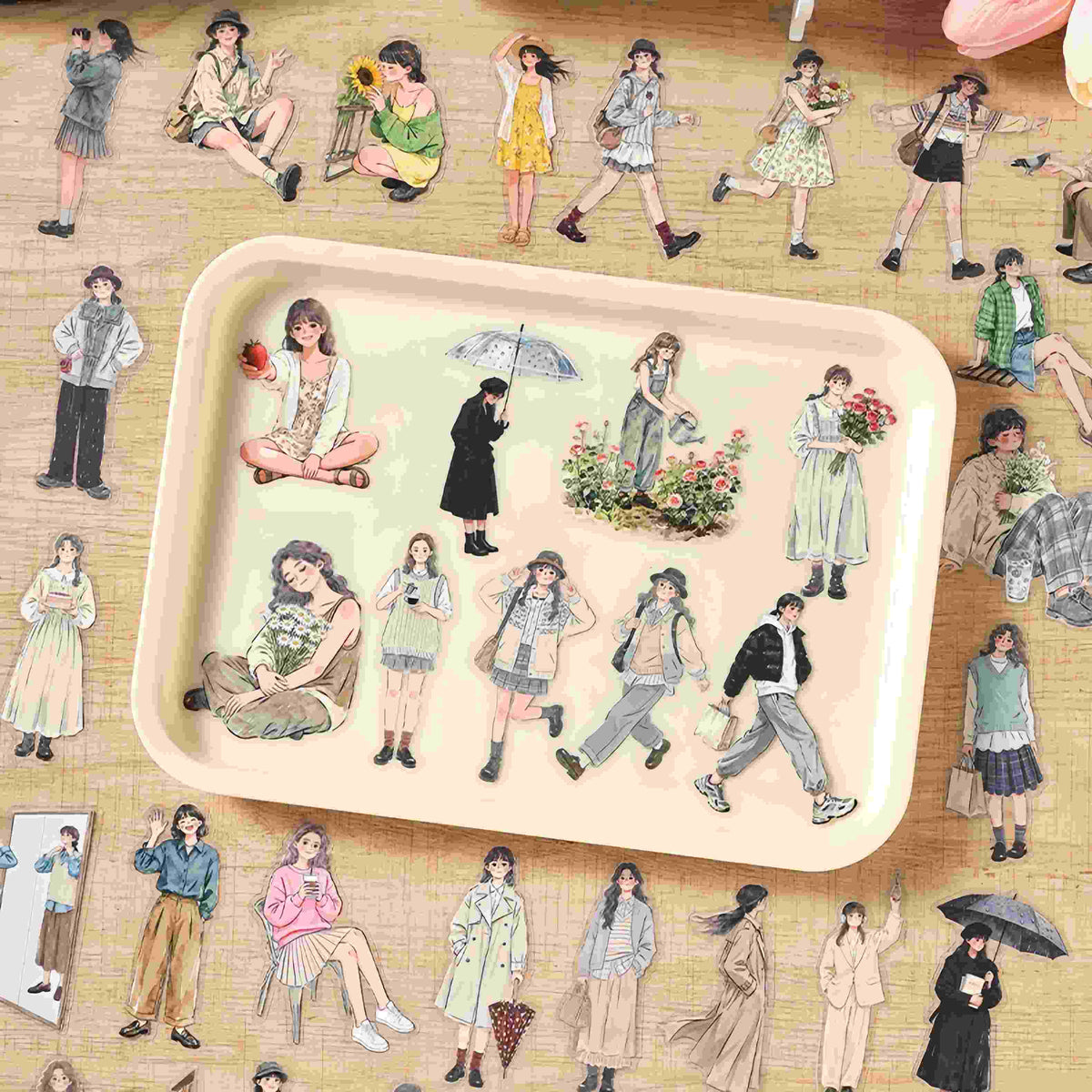 Die-cut stickers of a girl reading and stretching in pajamas