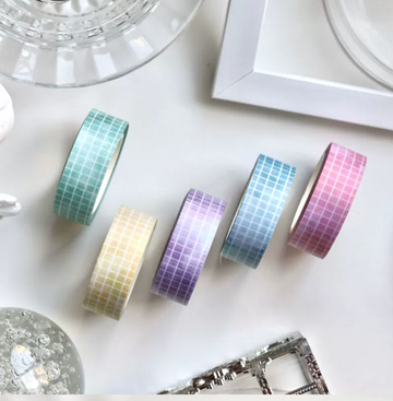 Pastel grid washi tape roll with pixel grid pattern