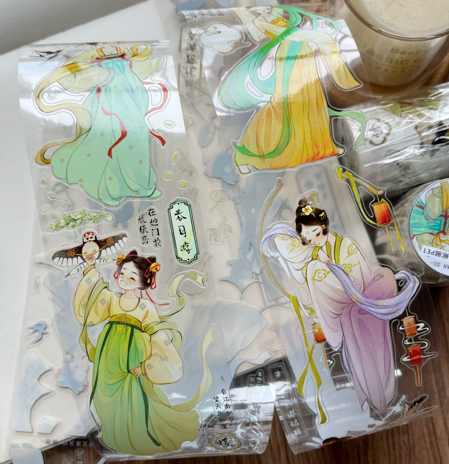 Chinese hanfu beauty die-cut tape strip showing graceful female figures surrounded by lanterns, birds, and bamboo