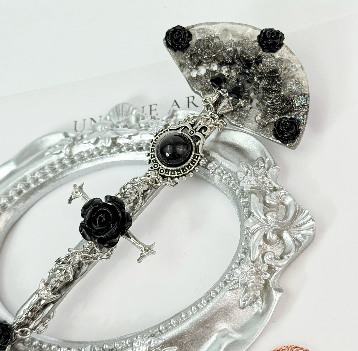 Gothic decorative craft knife with cross, bat, chain, rose, and gemstone charms