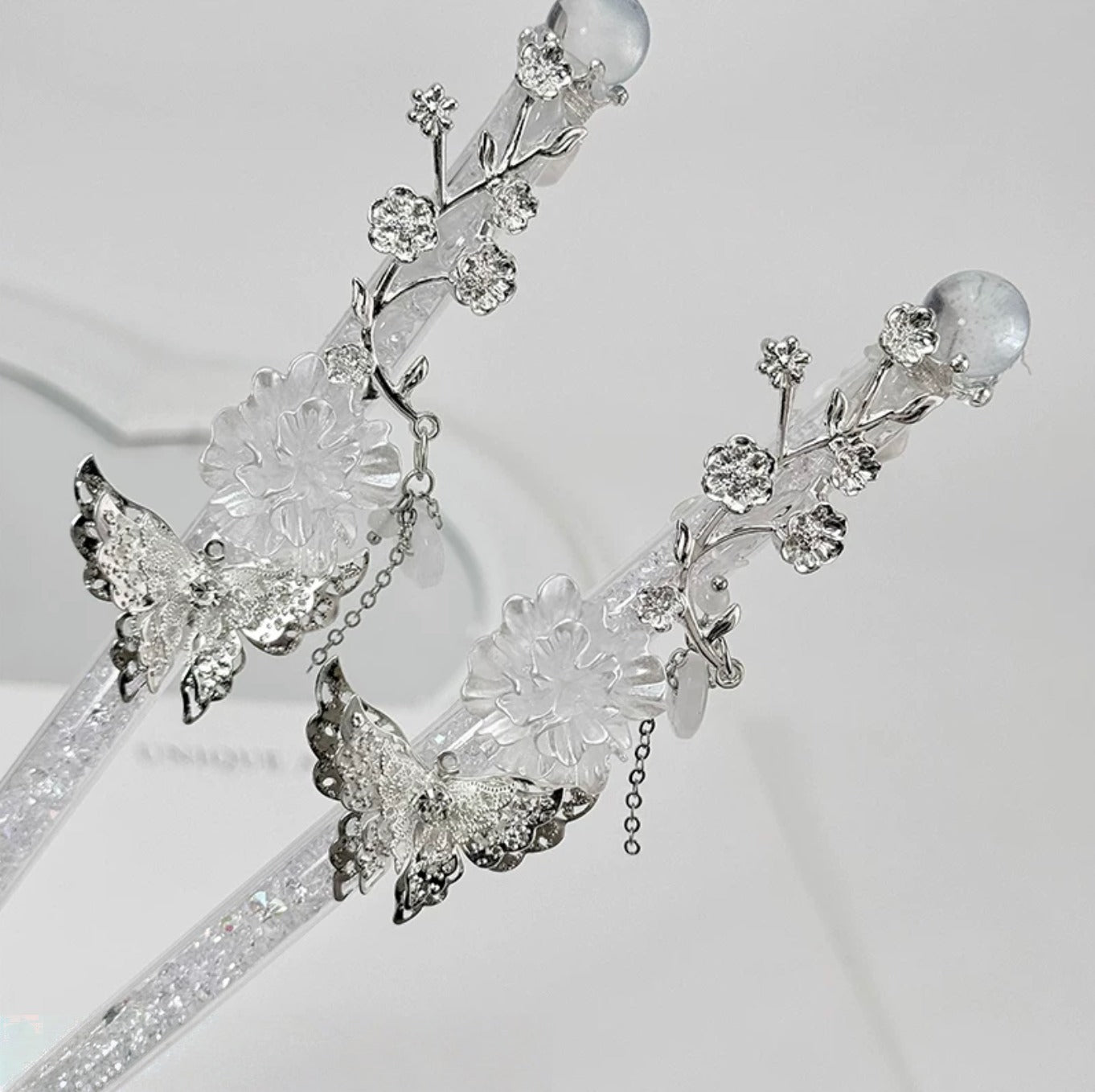 Celestial butterfly decorative craft knife with moon, sun, rose, and chain charms