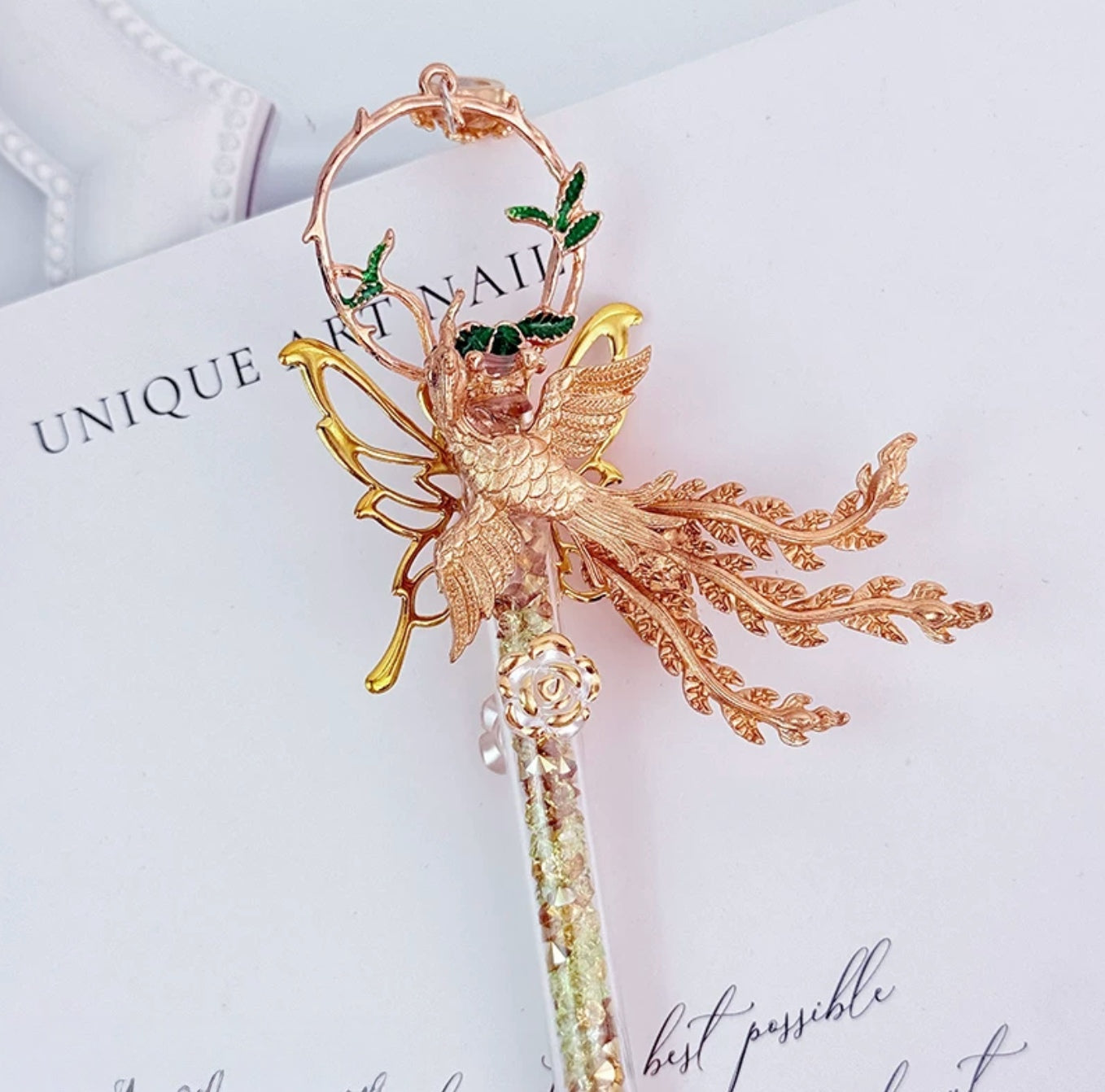 Gold butterfly decorative craft knife with floral charms and pearl accents