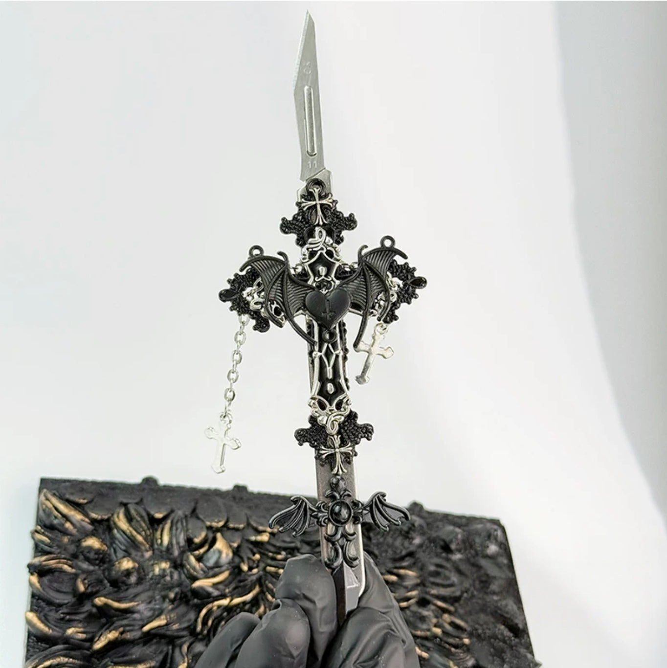 Gothic decorative craft knife with cross, bat, chain, rose, and gemstone charms