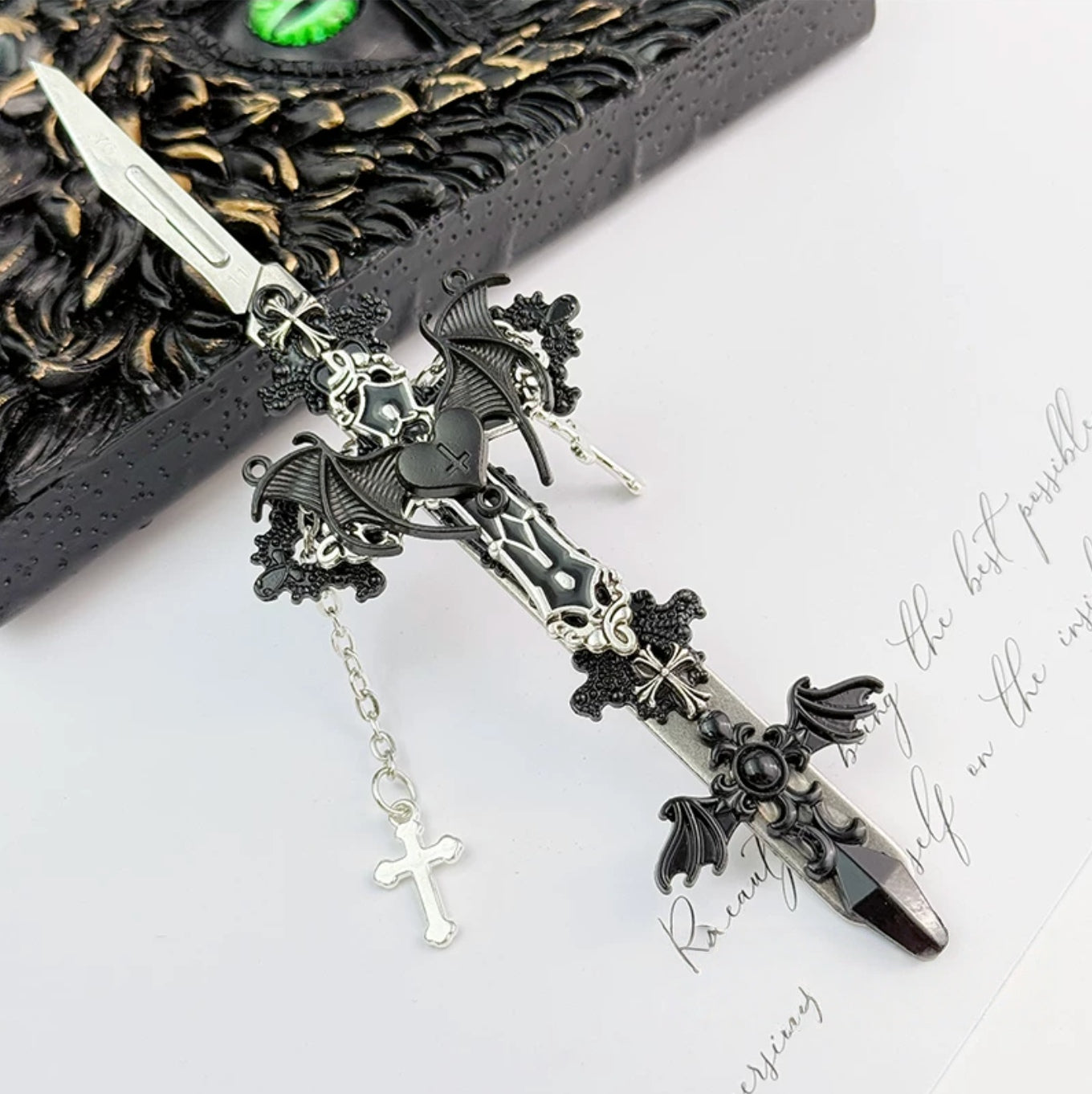 Gothic decorative craft knife with cross, bat, chain, rose, and gemstone charms