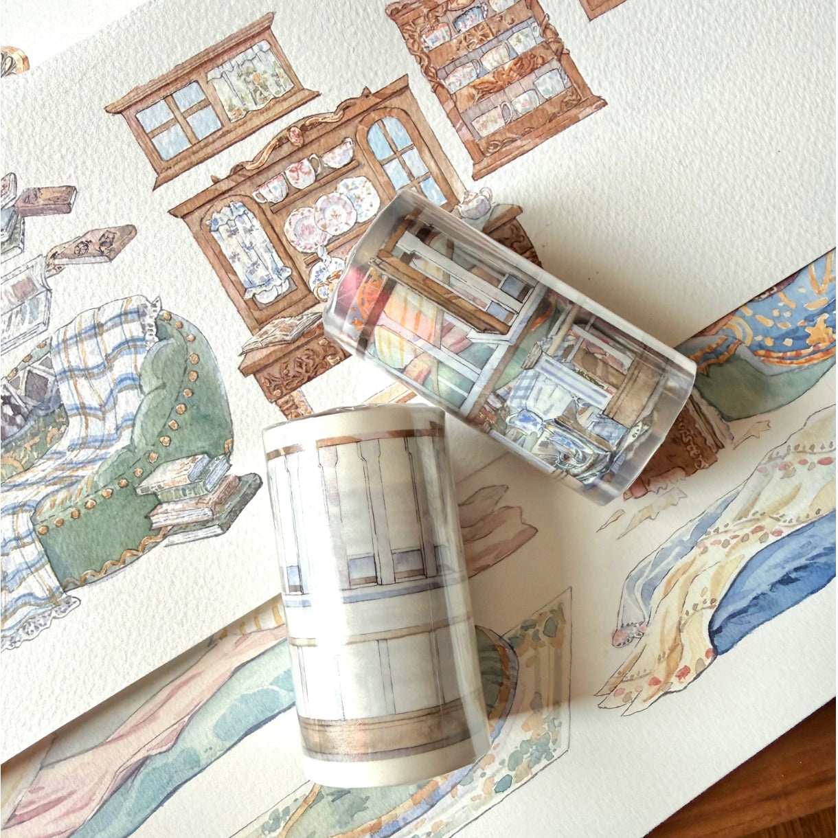 PET tape roll samples on watercolor cozy room background artwork with sofa, shelves, and bedding