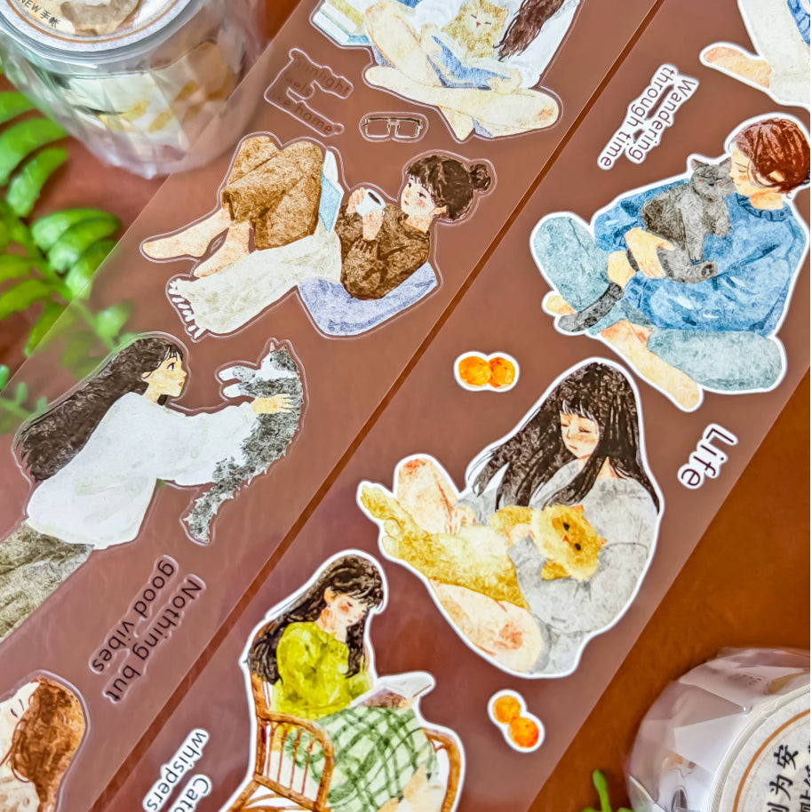 Transparent sticker roll with watercolor girls, cats, cozy reading scenes, cushions, drinks, and gentle quotes