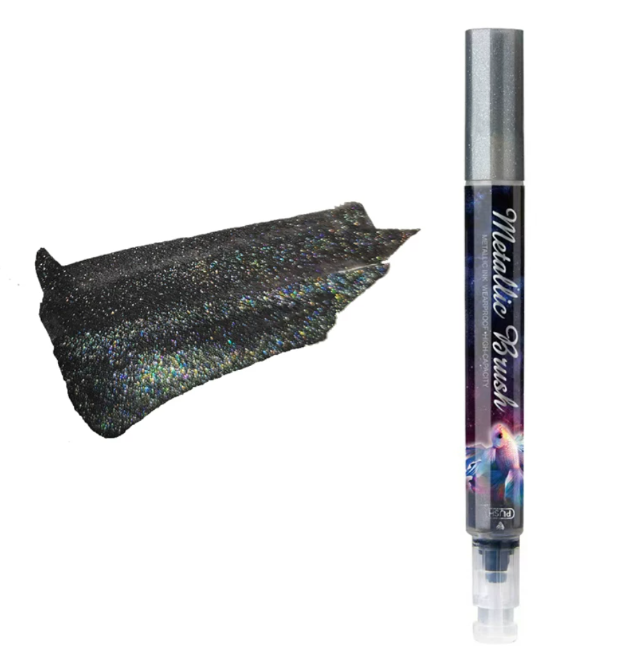 Metallic brush highlighter pen with shimmer ink, colored cap, and brush tip for lettering and notes