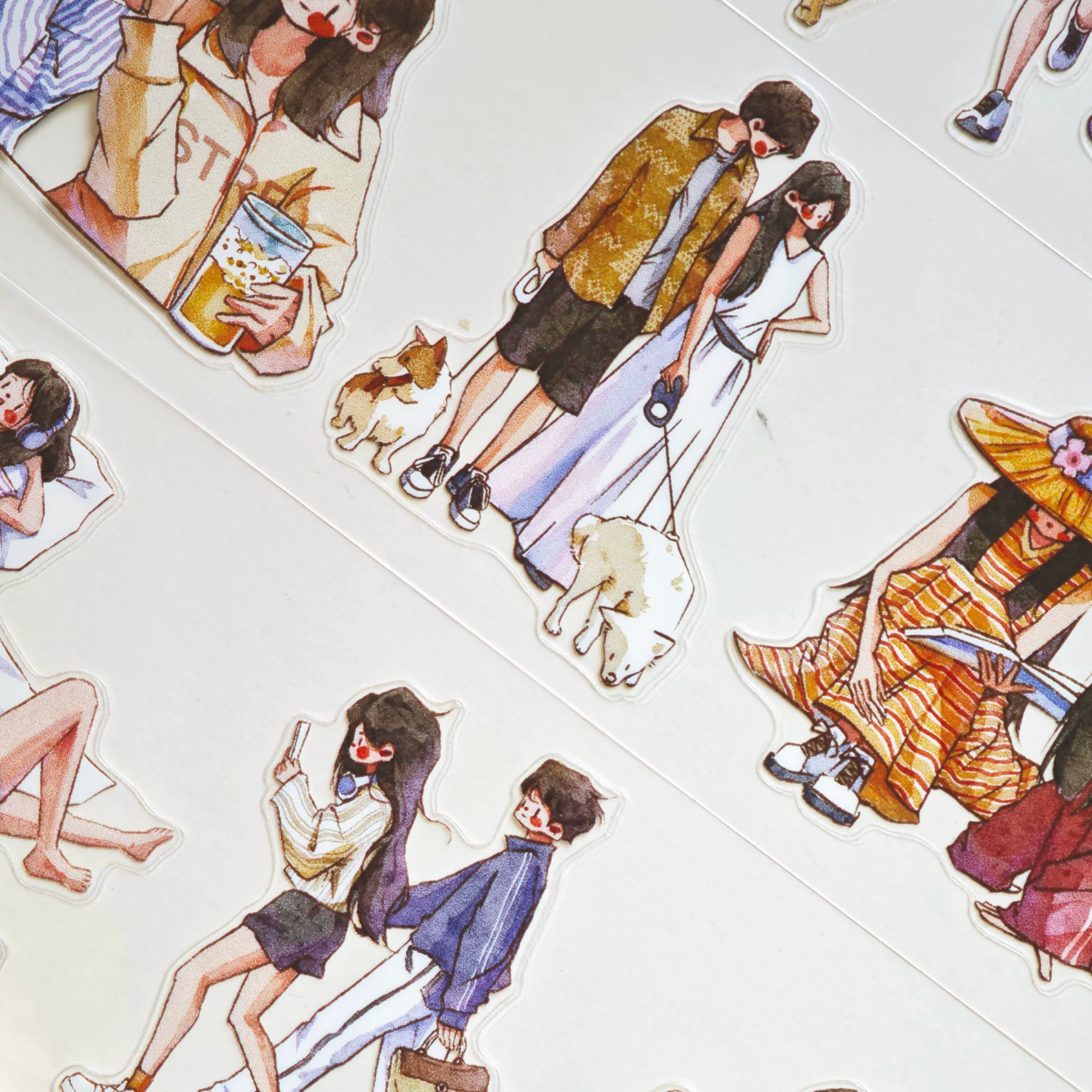 Little Moments character tape close-up with couples, dog, bicycle, and walking figures