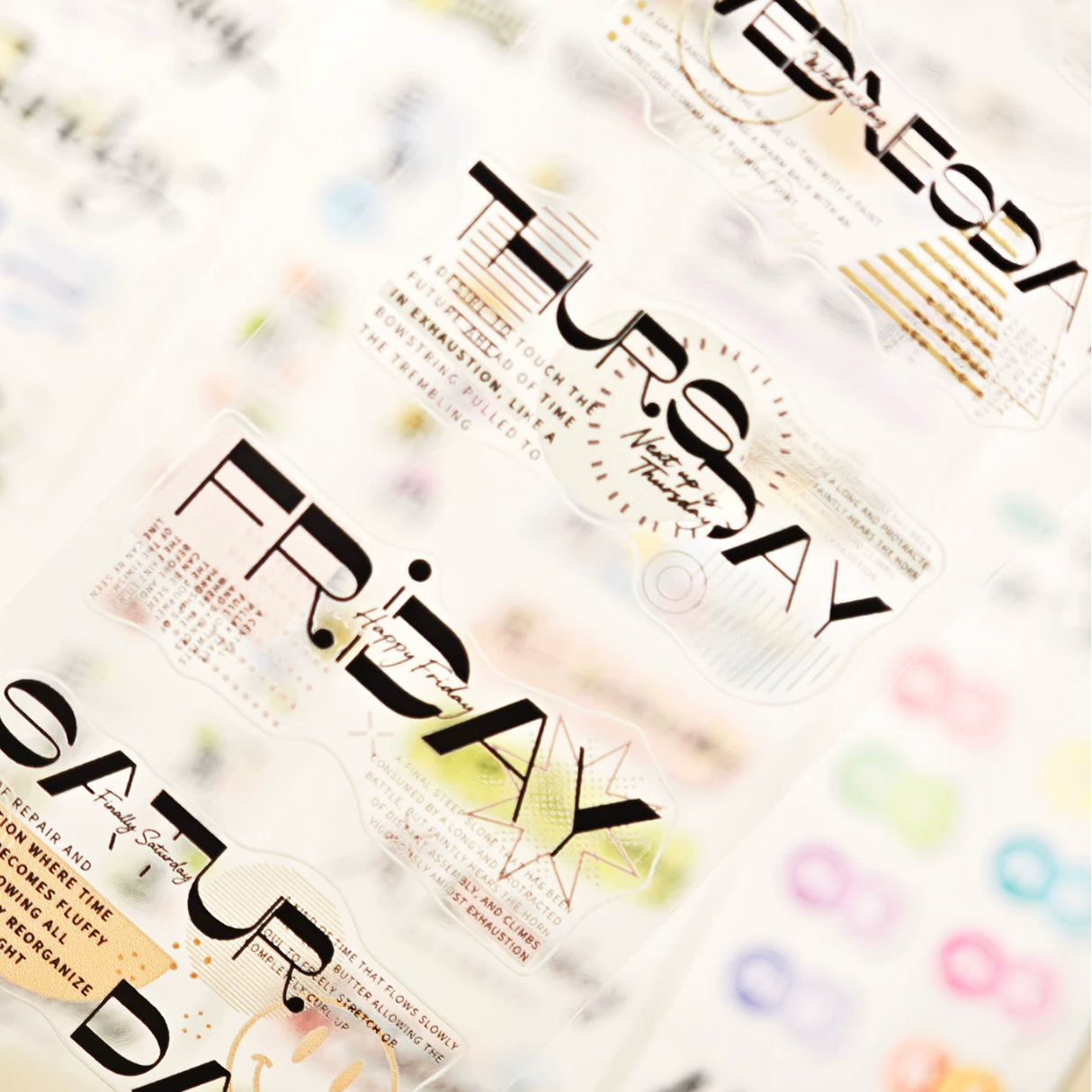 Weekly planner text tape close-up with bold Friday lettering and modern calendar typography