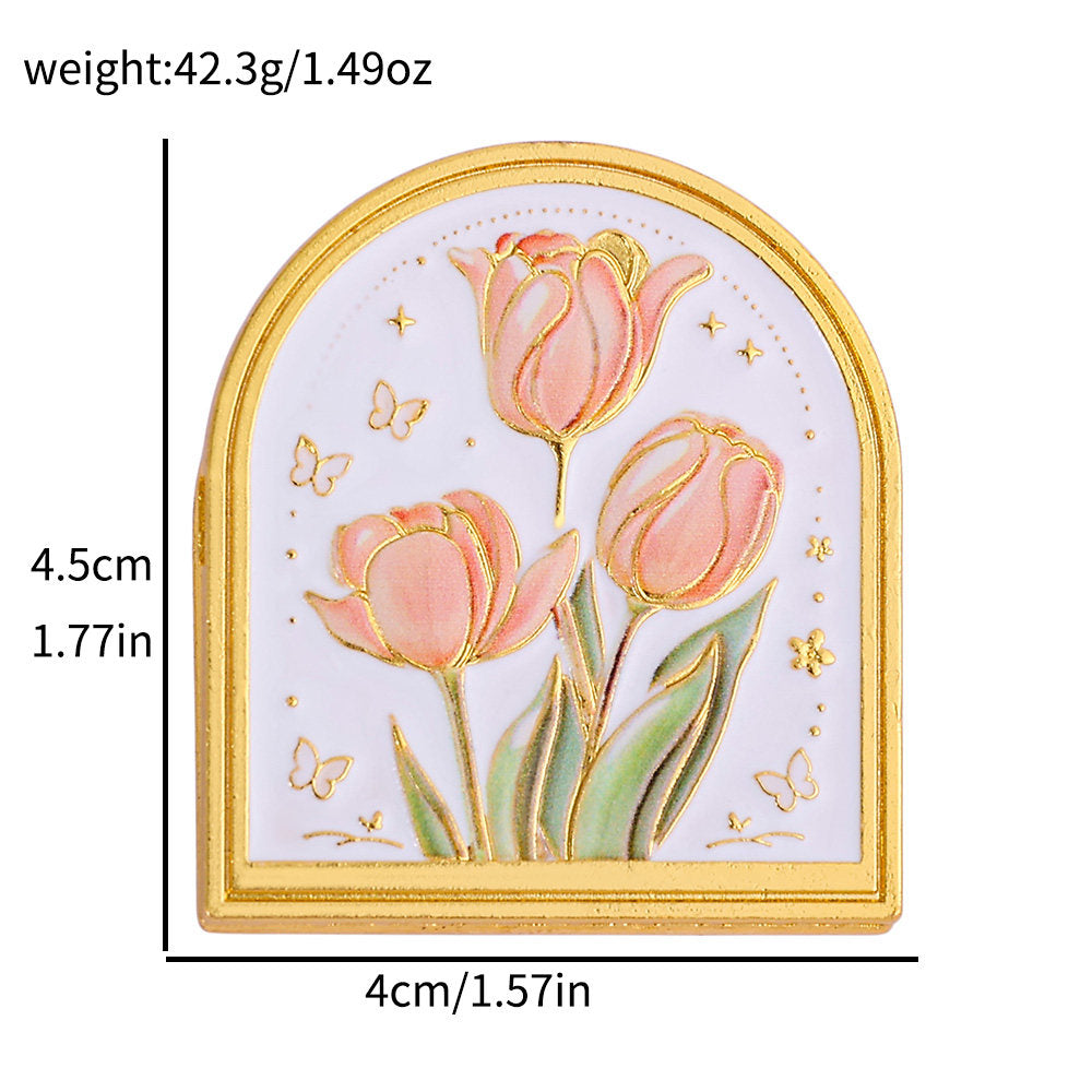 Embossed floral metal journal clip in gold-tone finish