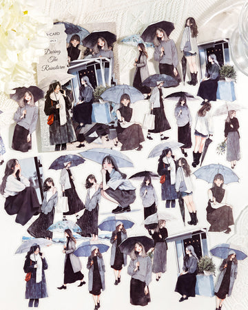 Die-cut sticker sheet of illustrated girls holding umbrellas in the rain, "During the Rainstorm" pack