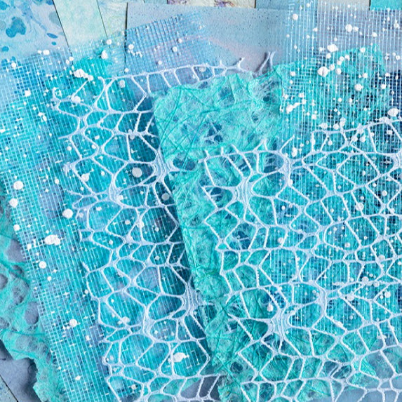 Mixed-texture pastel scrapbooking paper with romantic lace mesh overlay pattern