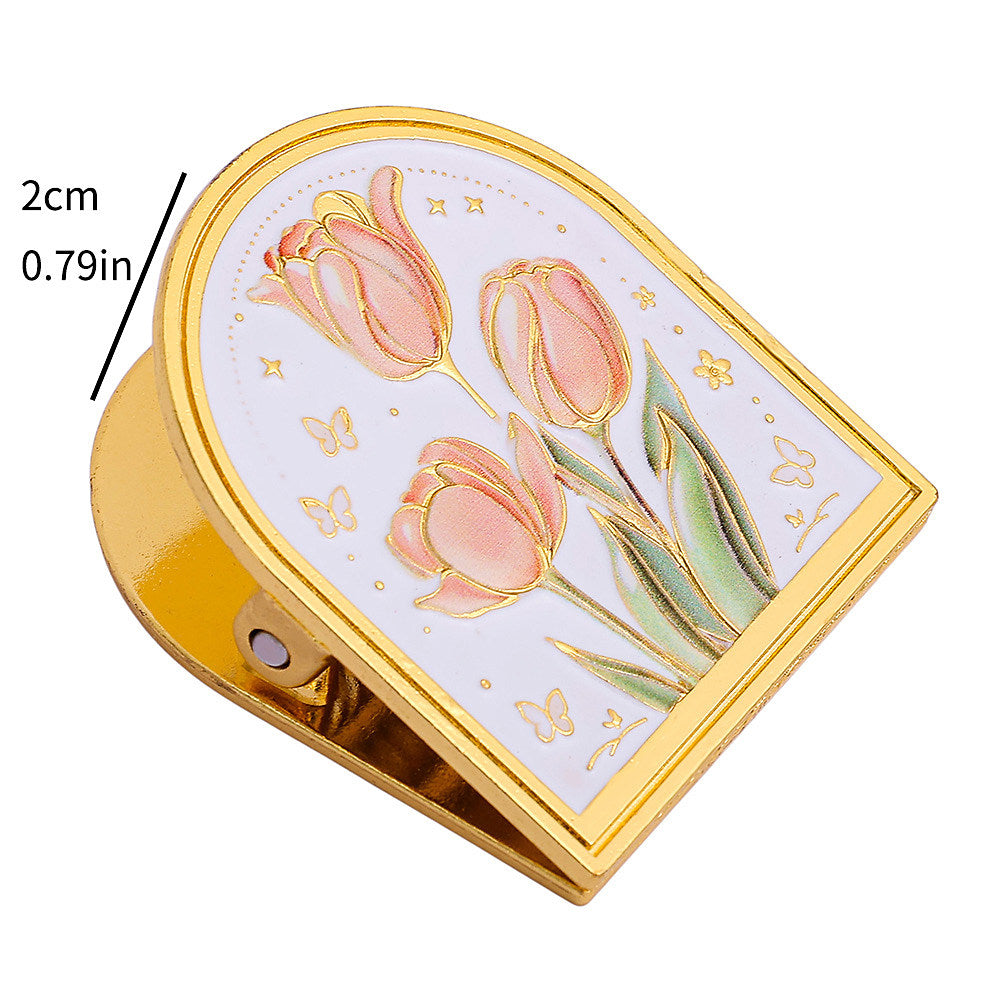 Embossed floral metal journal clip in gold-tone finish