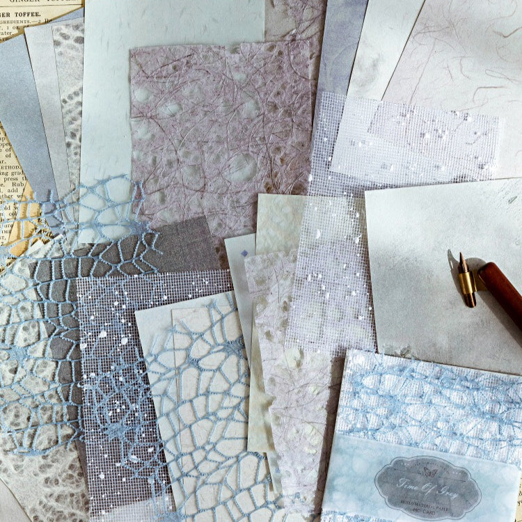 Mixed-texture pastel scrapbooking paper with romantic lace mesh overlay pattern