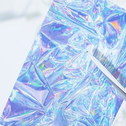 Holographic laser-effect sticker sheet with fragmented starry-sky pattern