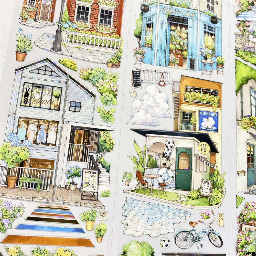 Charming Little Encounter PET Tape showcasing a cozy café street scene with detailed buildings, outdoor seating, and greenery.