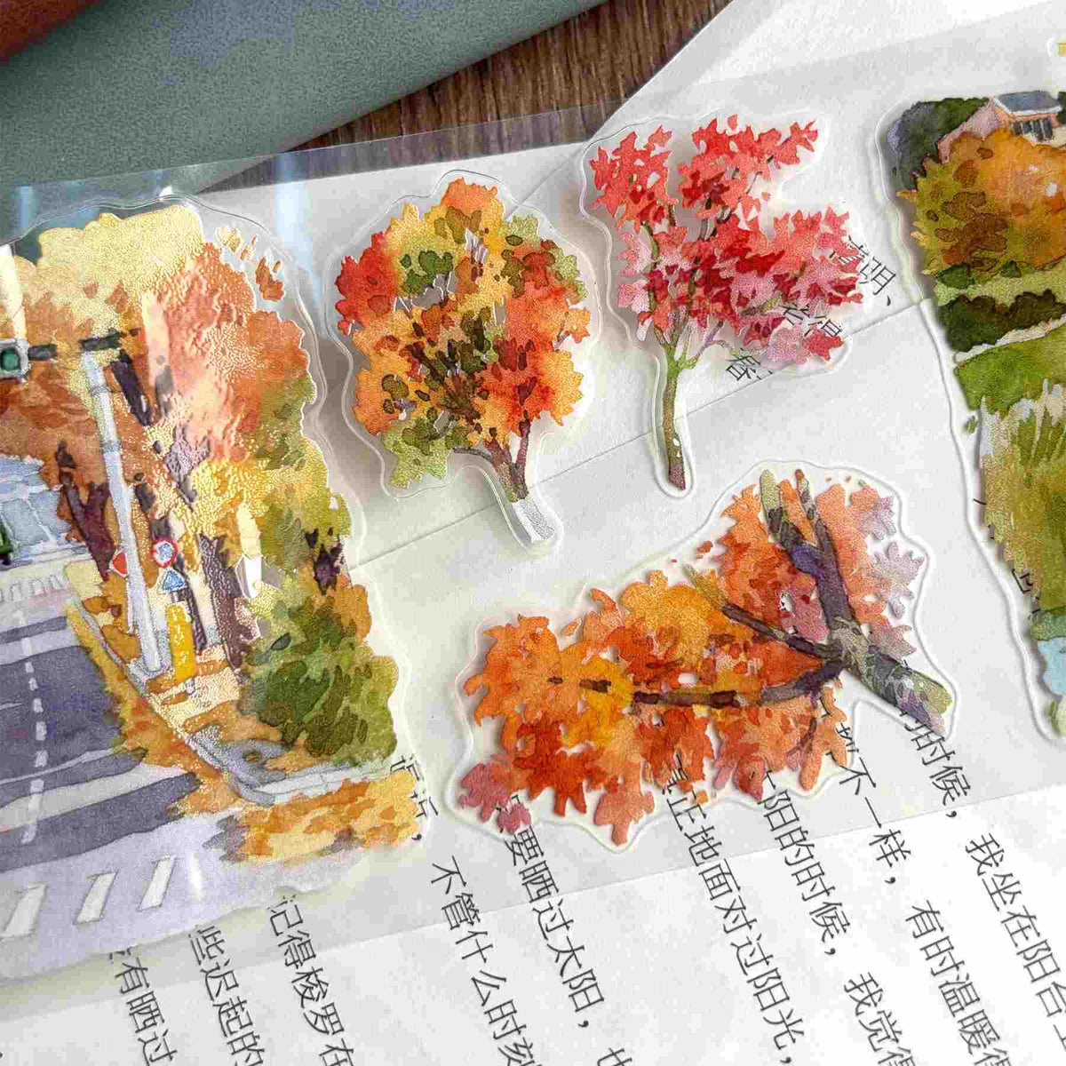 Die-cut washi tape featuring a golden ginkgo-lined street scene with houses and a canal