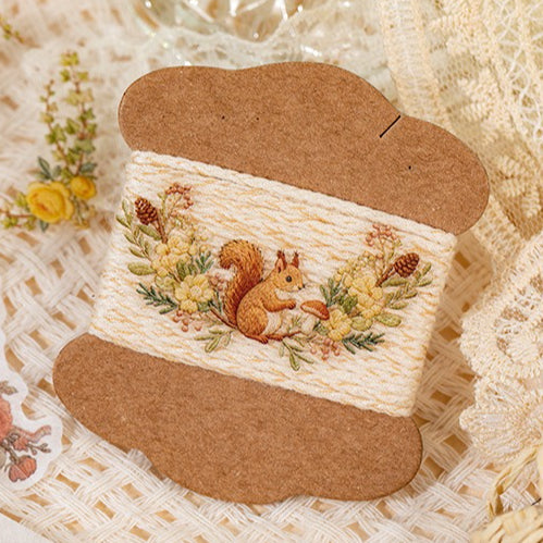 Floral embroidery frame sticker book with botanical borders, wreaths, rabbits, butterflies, ribbons, and photo frame designs