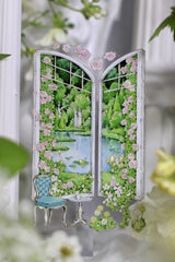 Delicate Castle Garden Window PET Tape featuring arched windows revealing enchanting gardens, blooming flowers, and fairytale towers.
