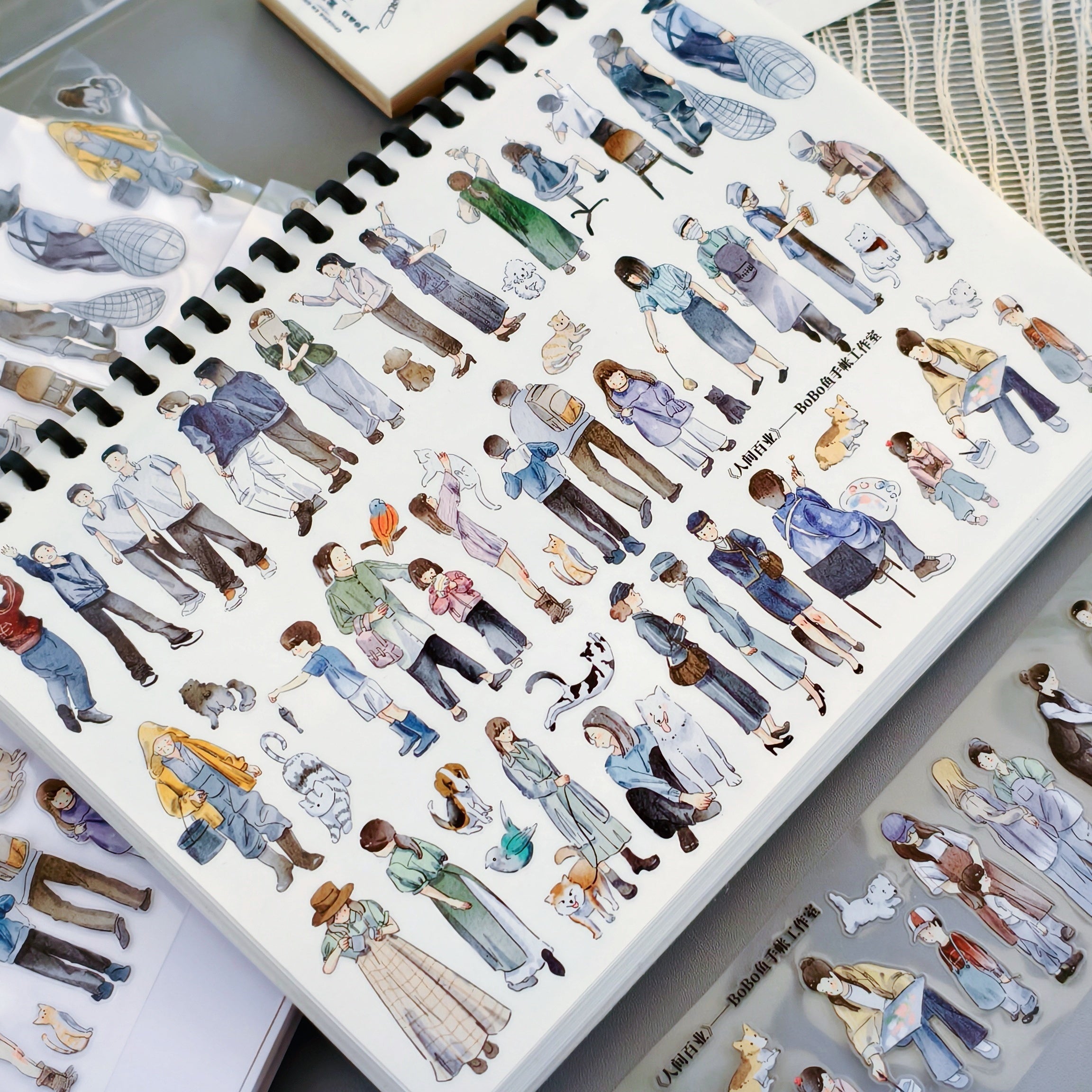 Sticker sheet featuring whimsical illustrations of people, dogs, and cats in a painterly style | Shroomi