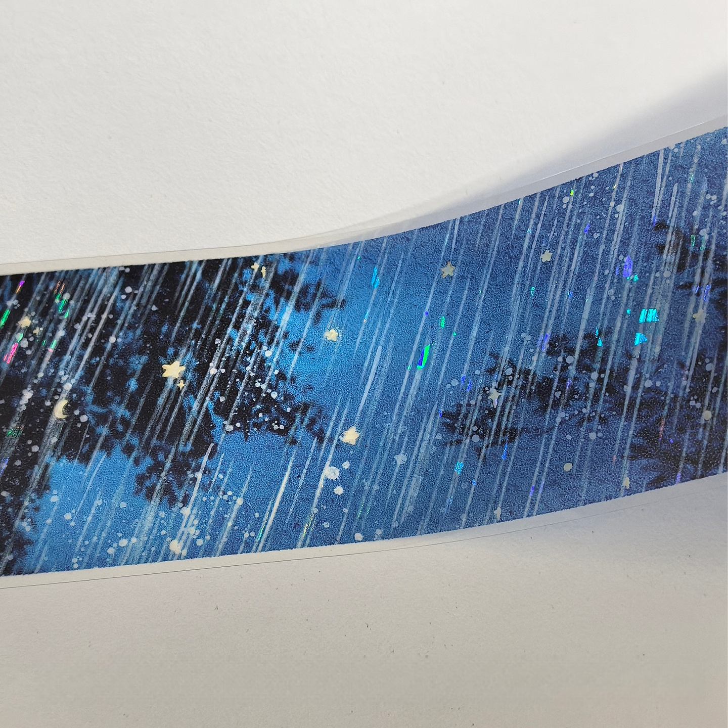 Blue decorative tape with a nighttime starry sky, rain, and glitter accents | Shroomi