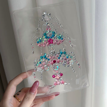 Clear photo card decorated with pink and blue rhinestone stickers