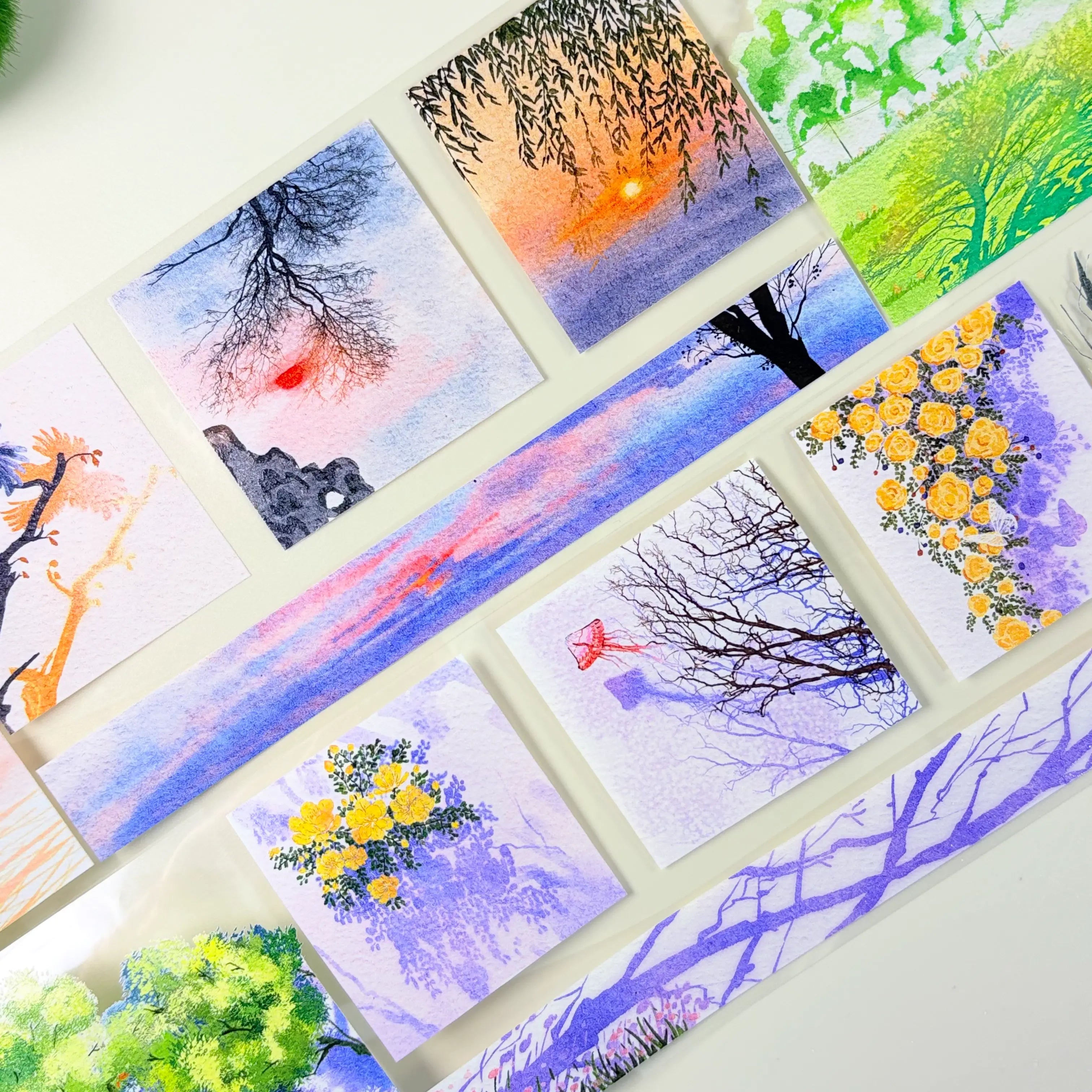 Decorative tape featuring watercolor style paintings of trees, flowers, jellyfish, and landscapes | Shroomi
