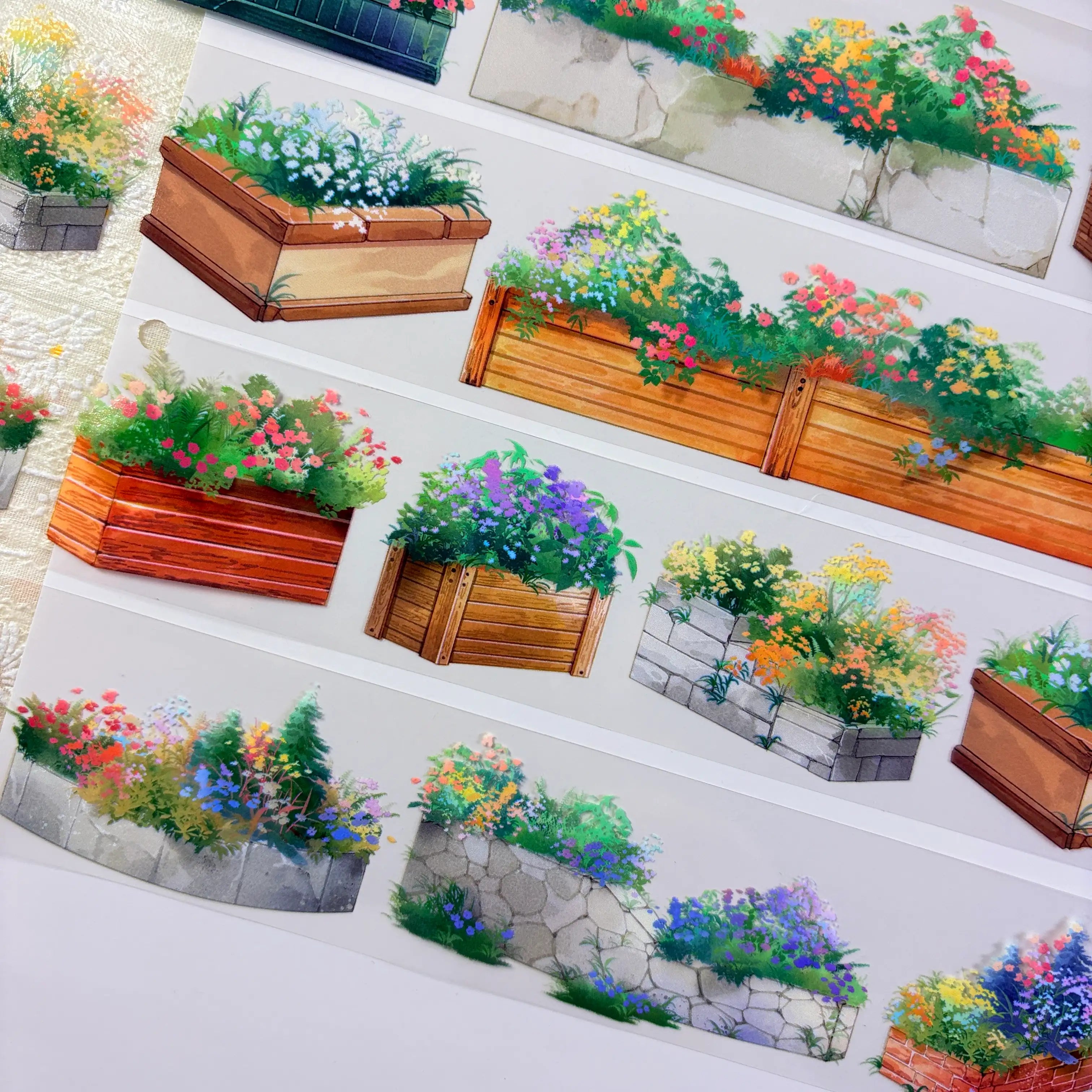 Flower planter box PET tape showing dark wood and stone planters with vibrant mixed garden flowers