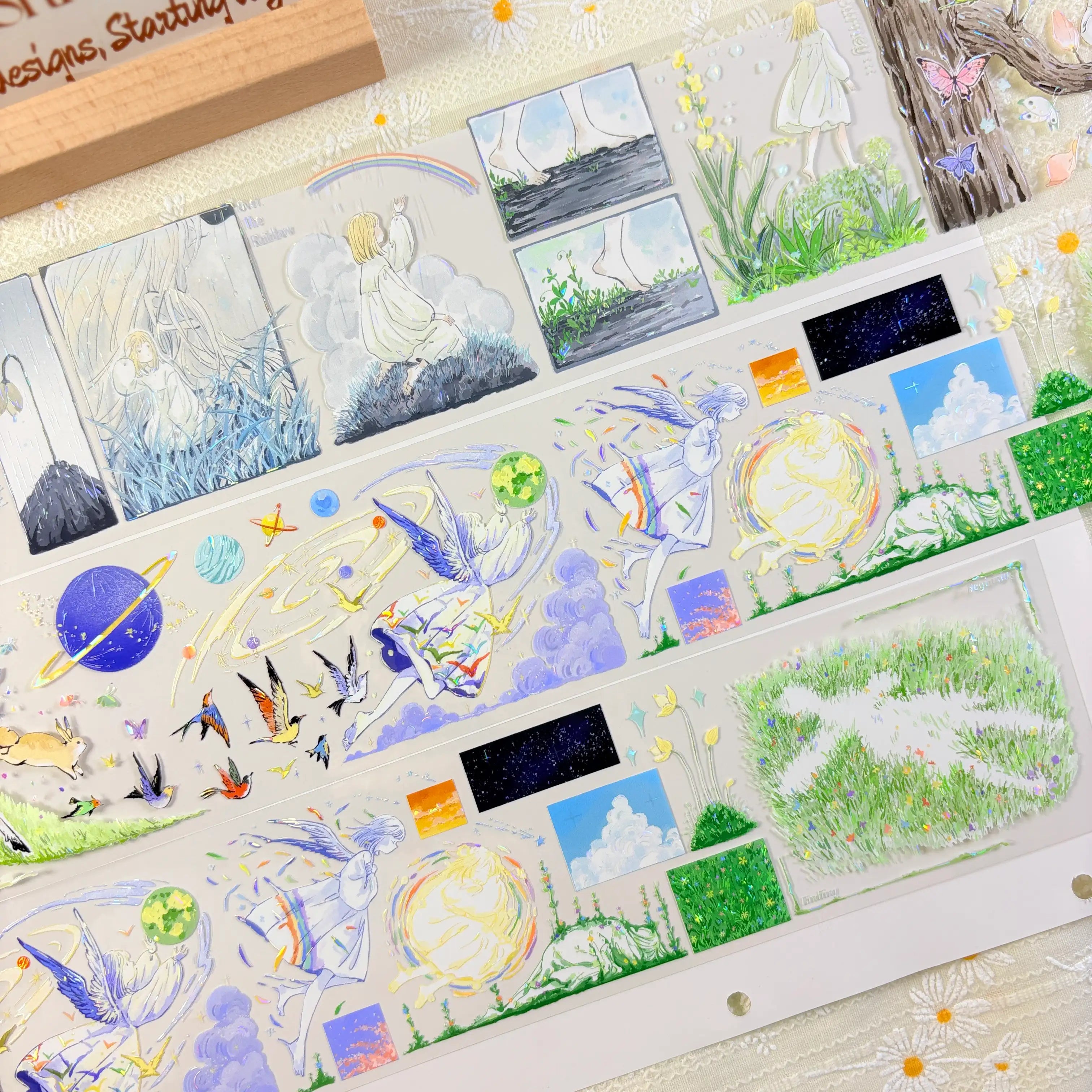 Close-up of Japanese nature fairy PET tape showing ethereal blue flower field and butterfly garden scenes