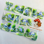 Charming PET tape featuring hand-painted cottages, blooming vines, and floral pots, evoking a serene countryside vibe.