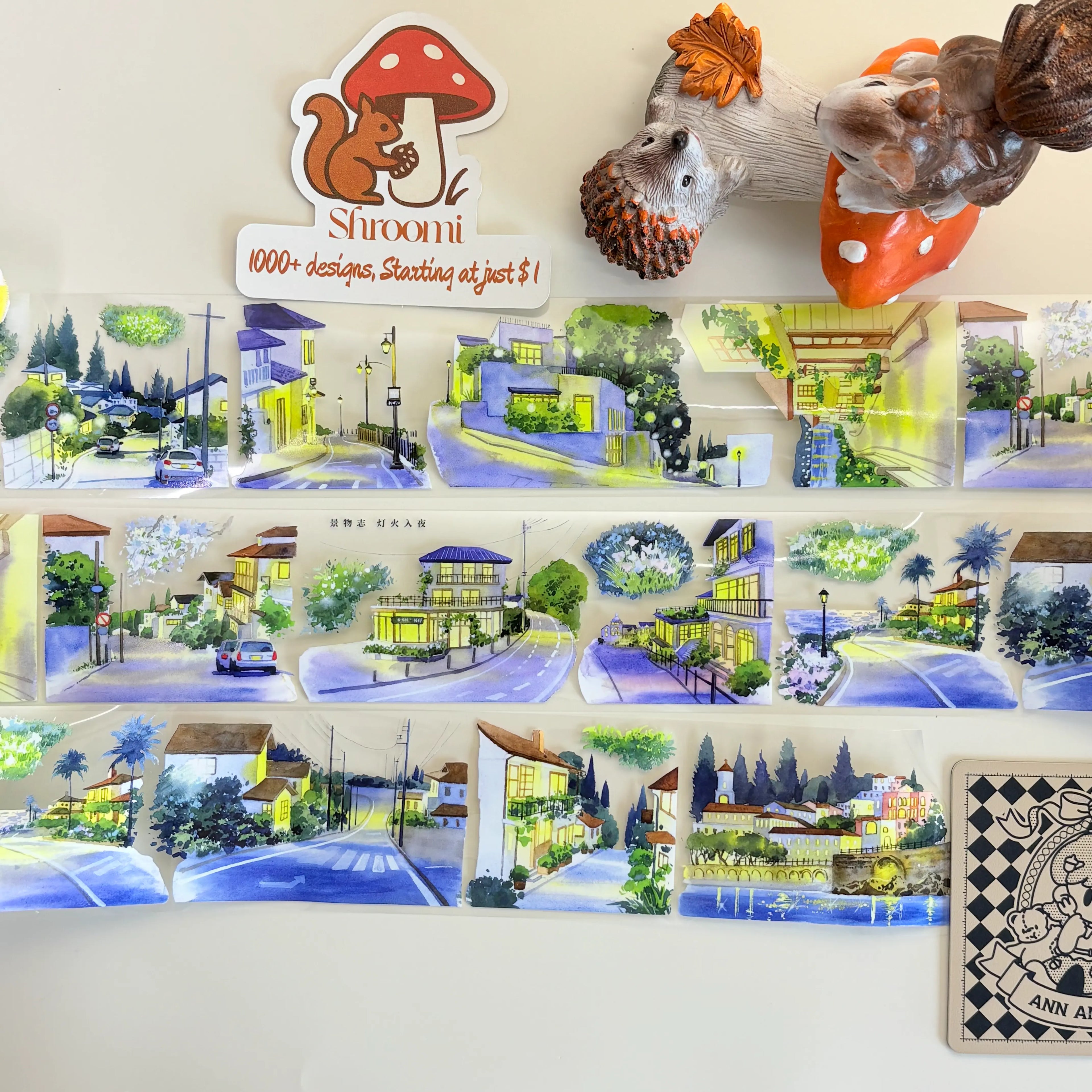 Collage of small town illustrations with a 'Shroomi' branding card on a white background