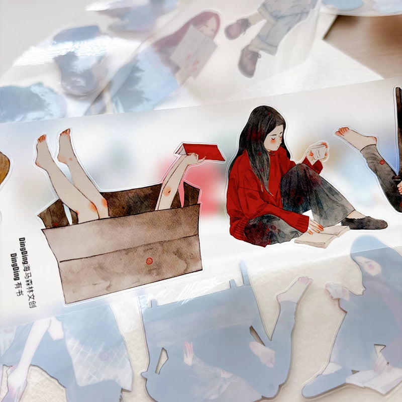 Tape roll and strips featuring girls reading books