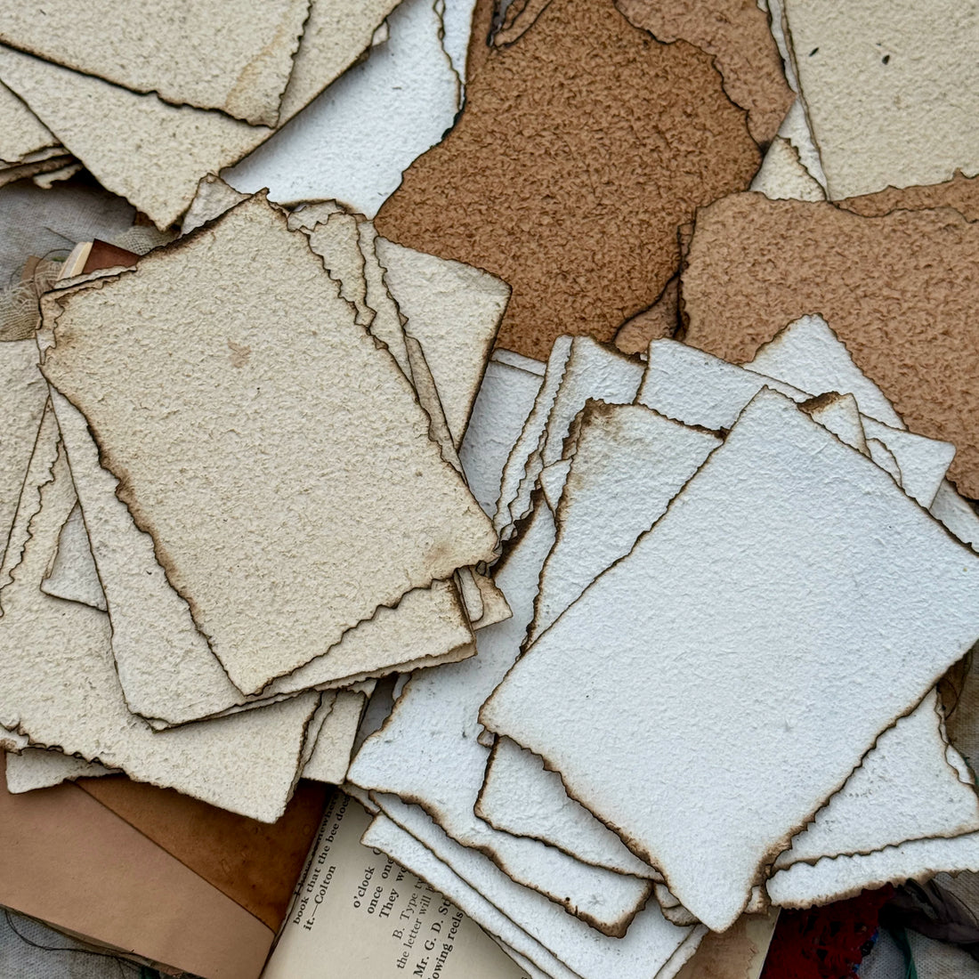 Vintage burnt edge handmade scrapbooking paper with aged neutral sheets