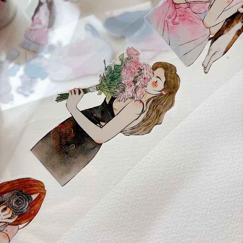 Die-cut blush pink girls tape pieces layered on white paper