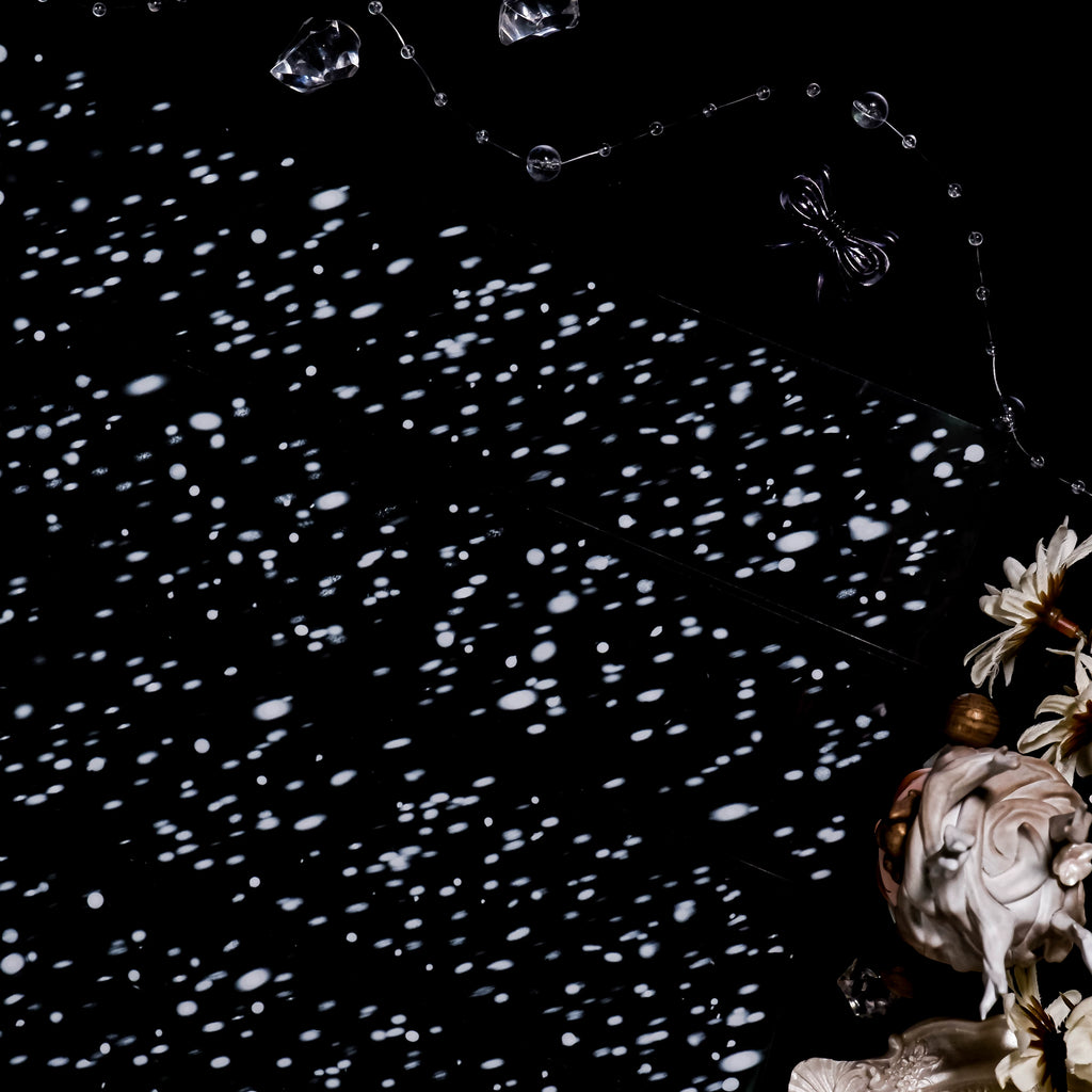 Snowflake dot patterns on black PET tape roll for scrapbooking