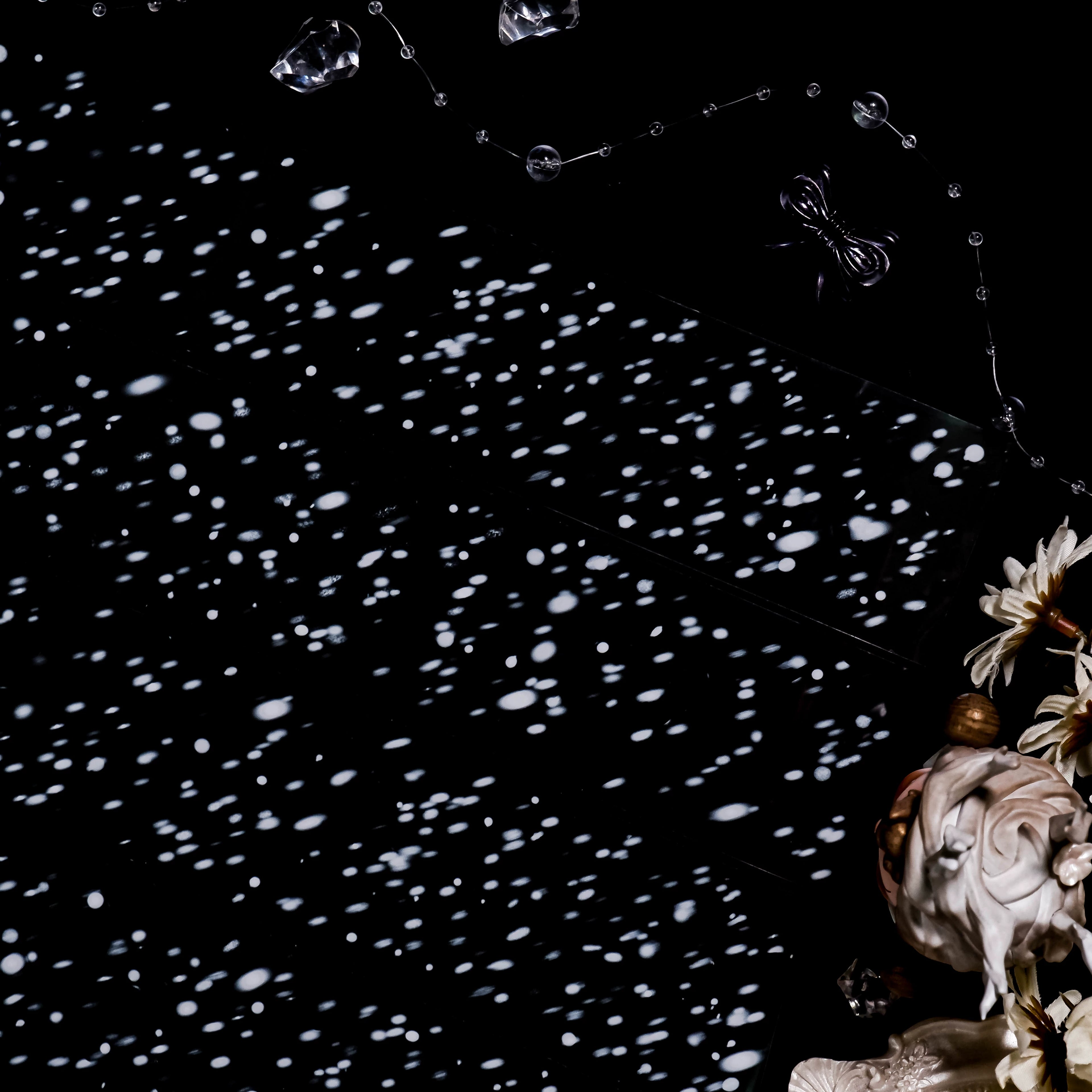 Snowflake dot patterns on black PET tape roll for scrapbooking