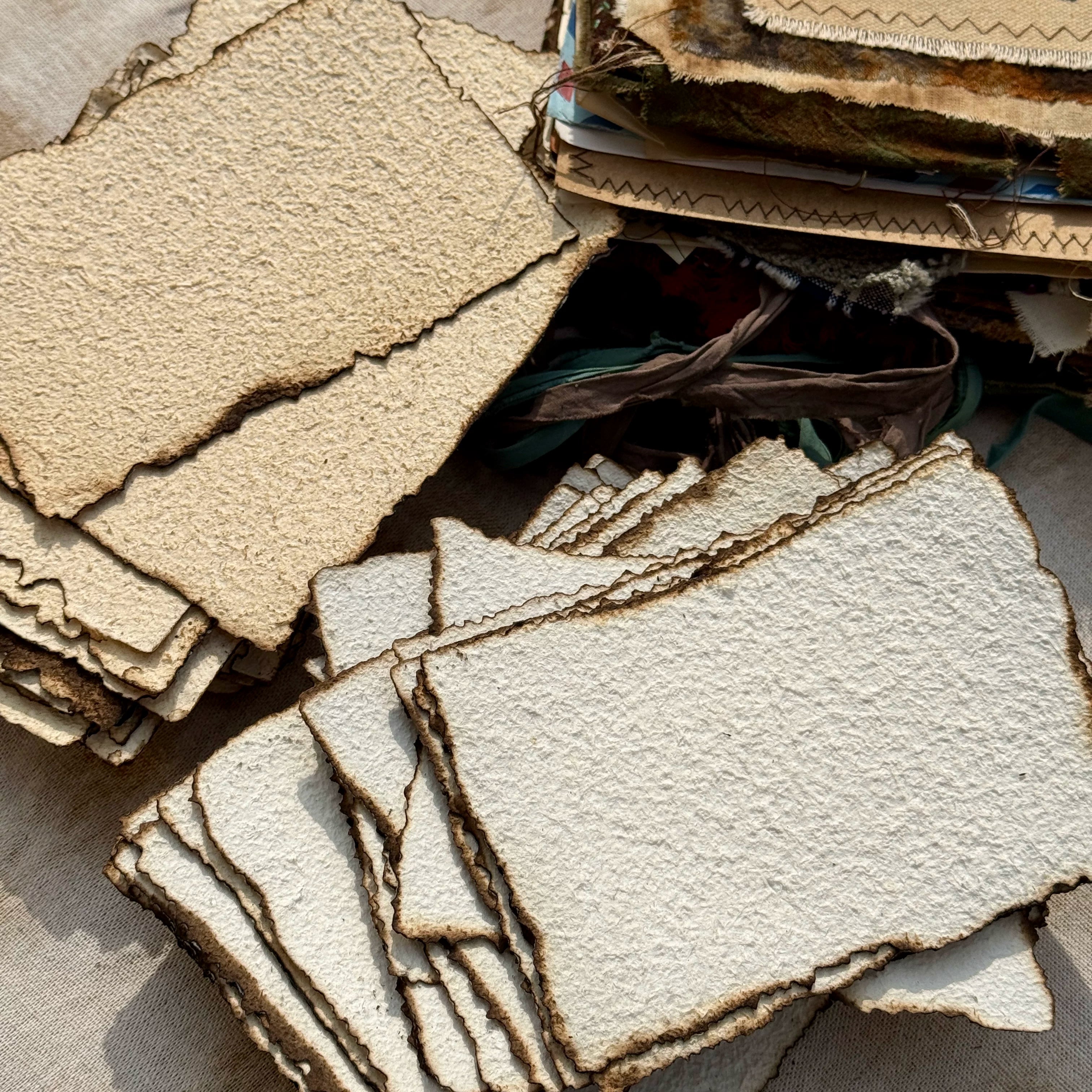 Vintage burnt edge handmade scrapbooking paper with aged neutral sheets