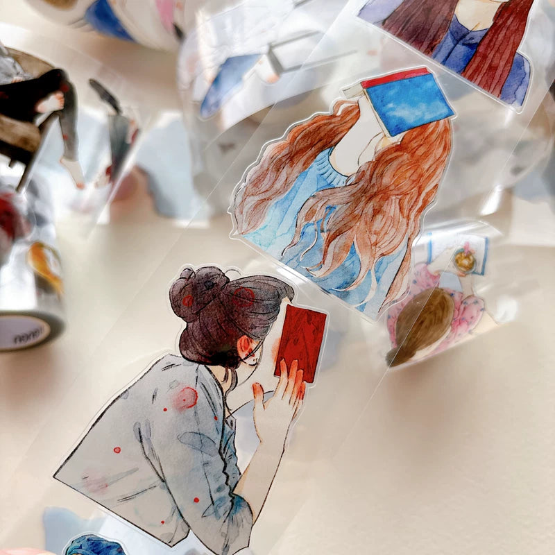 Tape roll and strips featuring girls reading books