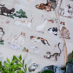 Shroomi's Courtyard Cats PET cut-out tape showcasing hand-painted cats and accessories for scrapbooking