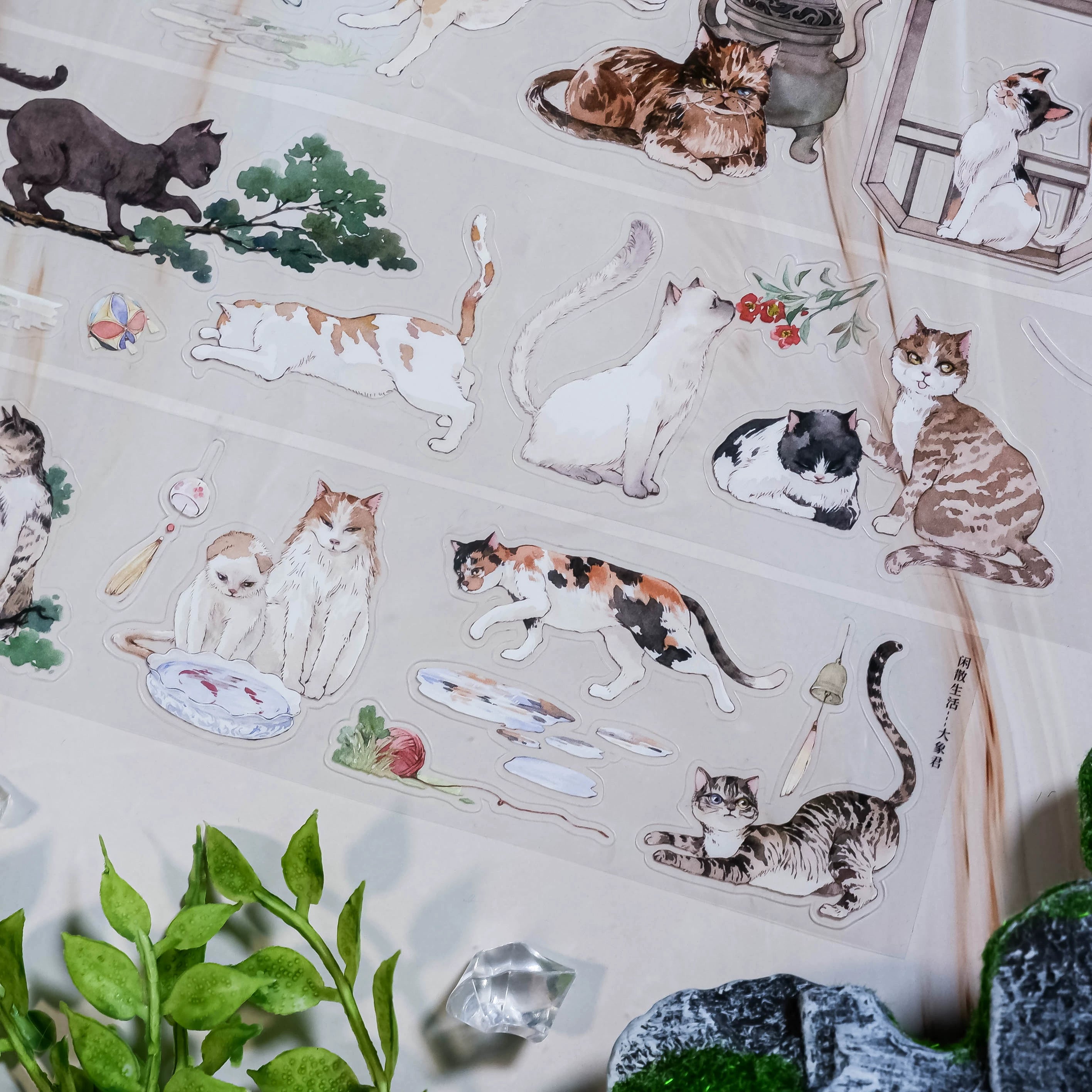 Shroomi's Courtyard Cats PET cut-out tape showcasing hand-painted cats and accessories for scrapbooking