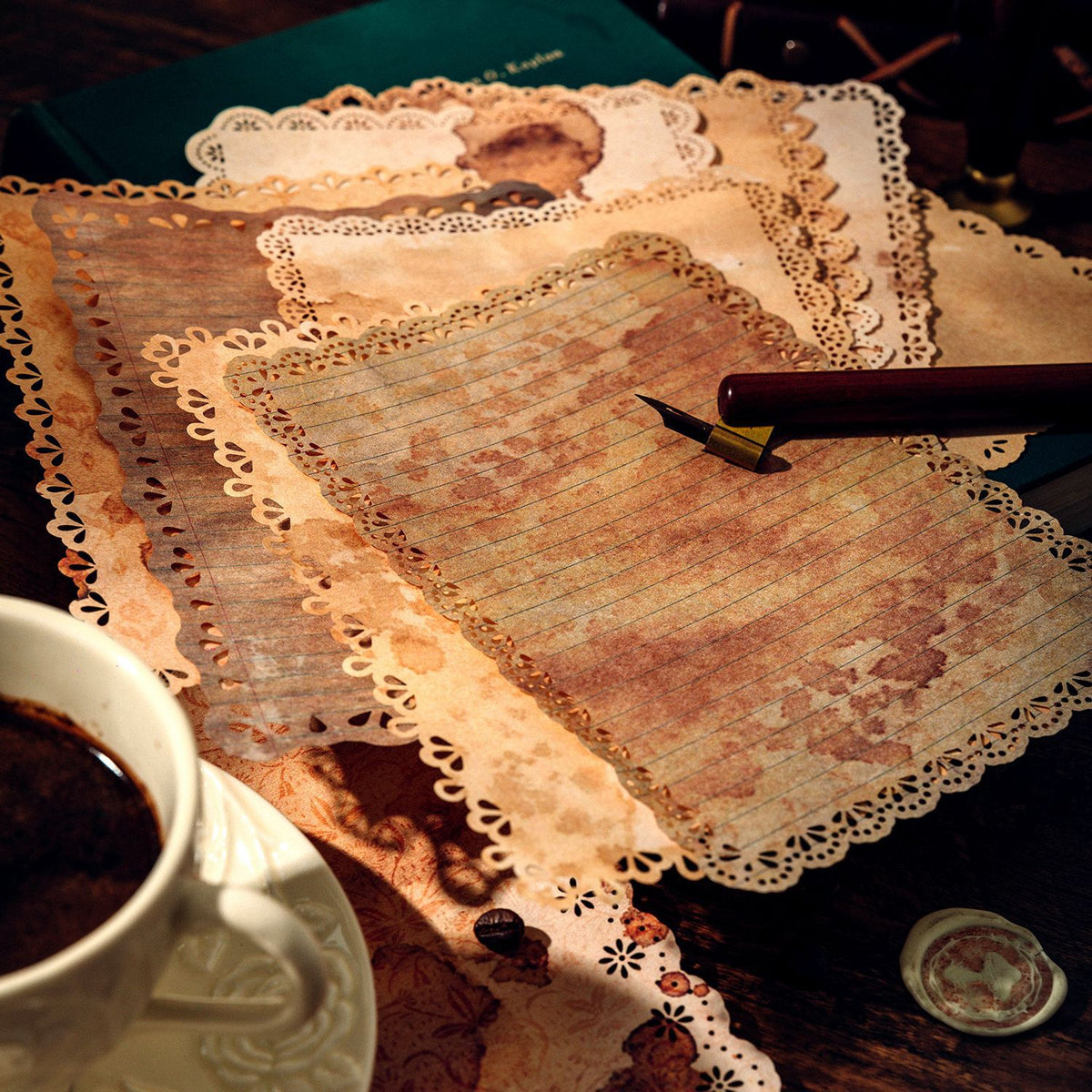 Vintage lace-edge scrapbooking paper design featuring antique lace borders and aged book-page texture