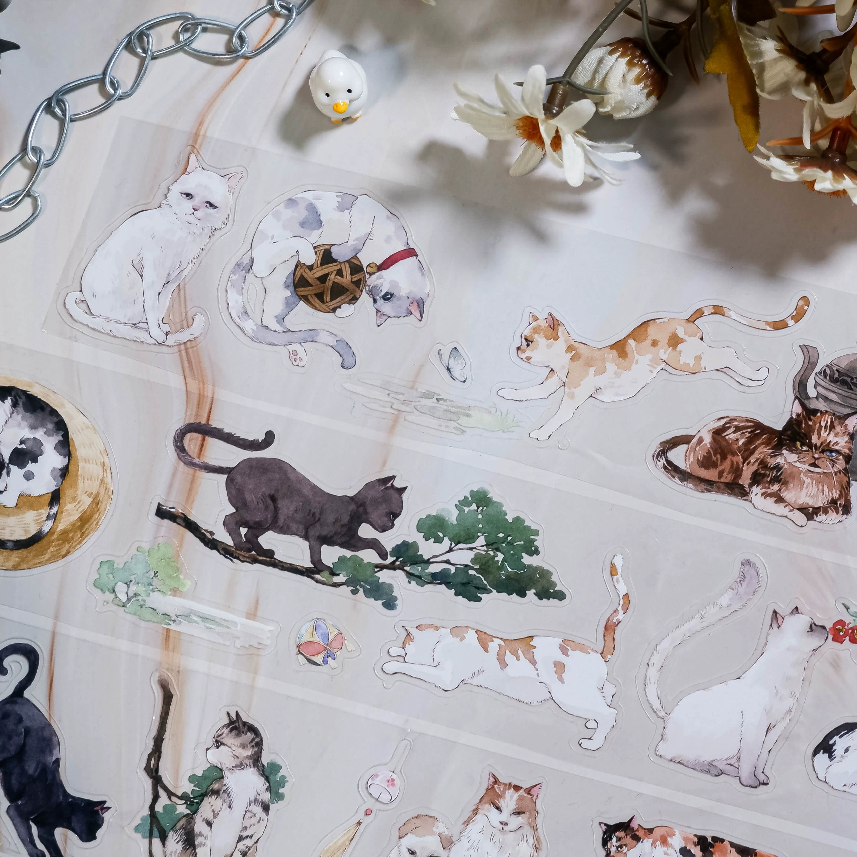 Shroomi's Courtyard Cats PET cut-out tape featuring hand-painted cats and courtyard scenes for journaling