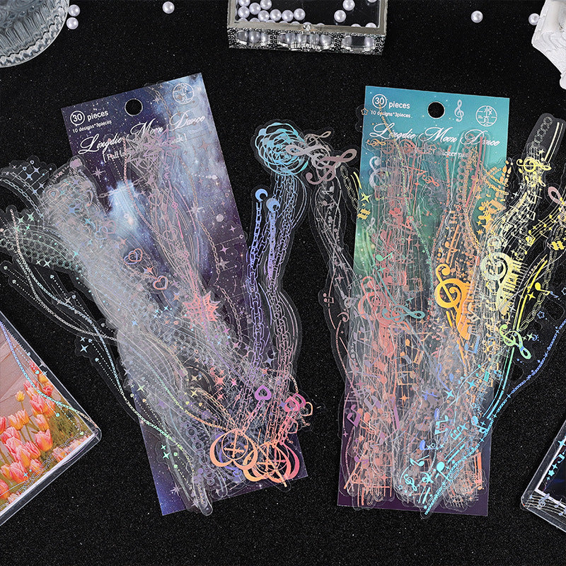 Dark holographic lace border sticker strips with color-shifting glow effect for night aesthetic journaling