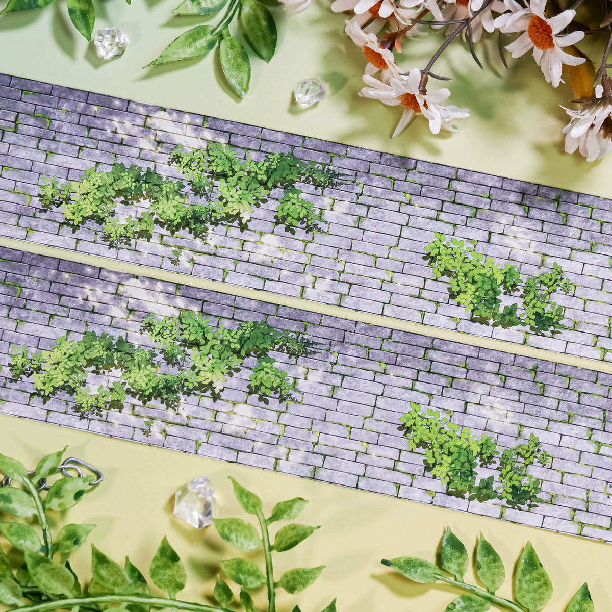 Mossy Brick Wall Washi Tape – weathered gray brick wall pattern with patches of green moss, alternate angle